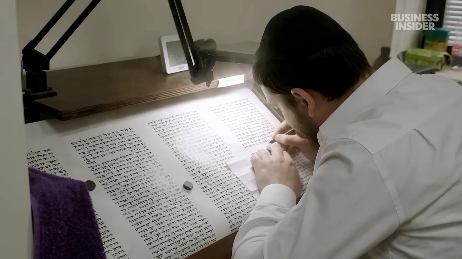 Scribe writing a scroll