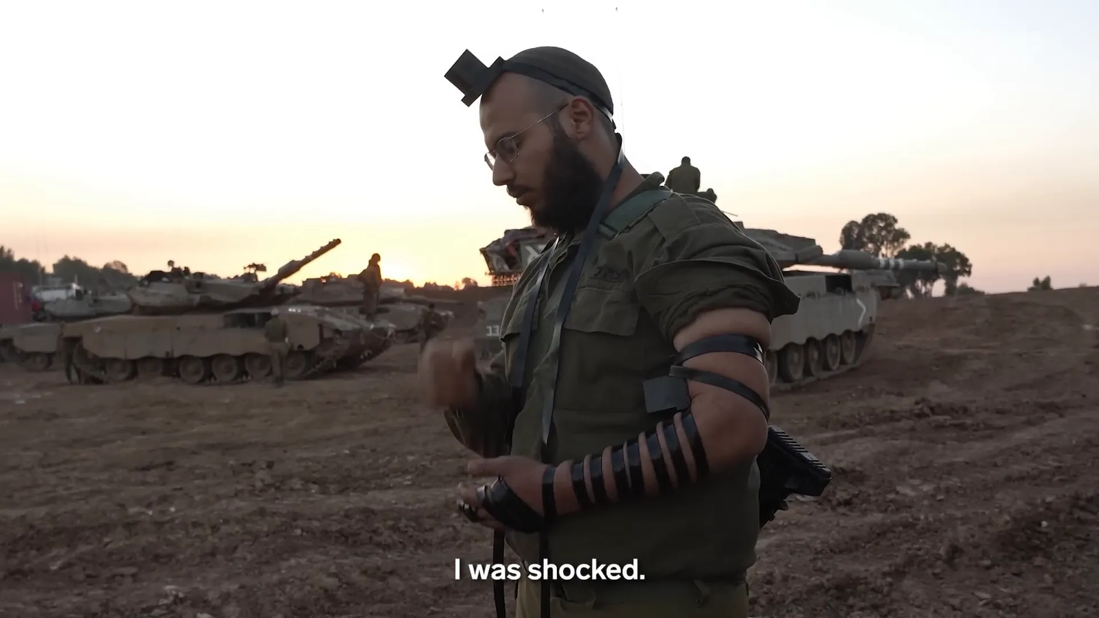 Israeli soldiers preparing for battle with Tefillin